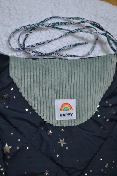 étiquette HAPPY (Ikatee) intérieure de mon manteau